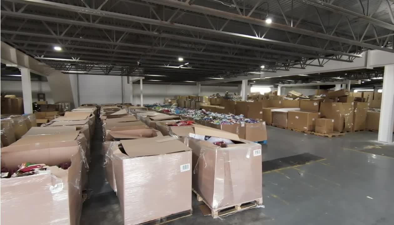 Rows of liquidation merchandise inside the OTG warehouse